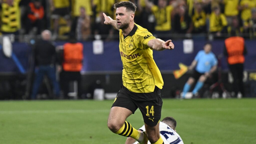 Champions League: Borussia Dortmund segura PSG e larga em vantagem