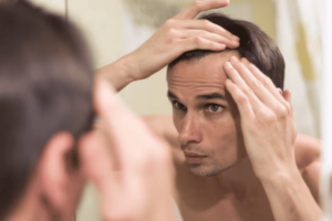 Por que Minoxidil faz o cabelo crescer?