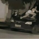 Vídeo: mulher sobe em carro em movimento para tentar impedir